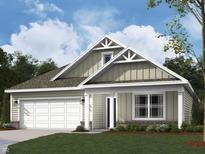 Inviting single-story home featuring a two-car garage and a charming covered front porch at 2159 Warbler St, Danville, IN 46122