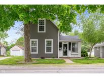 Charming two-story home with gray siding, white trim, and a well-maintained front yard at 3019 W Huntsville Rd, Pendleton, IN 46064