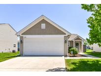 Charming single-Gathering home with a well-manicured lawn and a two-car garage at 4033 Tahoe Dr, Indianapolis, IN 46235