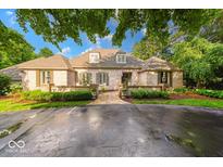 Charming single-story home with a brick facade, manicured landscaping, and a welcoming front entrance at 8065 Bayberry Ct, Indianapolis, IN 46250