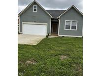 Charming single-Gathering home featuring a two-car garage and well-maintained front yard at 336 W 29Th St, Indianapolis, IN 46208