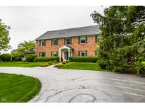 Charming two-story brick home with manicured landscaping and a welcoming entrance at 5356 S Us 421, Zionsville, IN 46077