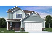 Inviting two-story home with a two-car garage, attractive siding, and a well-maintained lawn at 1577 Vision Ct, Danville, IN 46122