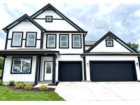Two-story home with a modern farmhouse design, black trim, and an attached two-car garage at 1534 Trichel Dr, Greenwood, IN 46143