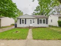 Charming single-story home with a well-maintained front yard and classic curb appeal at 602 W 34Th St, Anderson, IN 46013