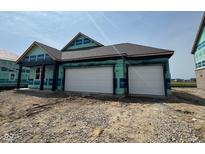 New construction home featuring a two-car garage, black trim, and architectural roofing at 1351 Foxtail Ln, Greenwood, IN 46143