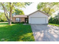 Charming single-story home with brick and vinyl siding and attached two-car garage at 18021 Sanibel Cir, Noblesville, IN 46062