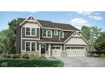 Beautiful two-story home with a two-car garage, landscaping, and gray siding at 4400 Persian St, Greenwood, IN 46143
