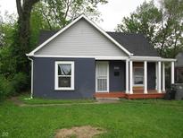 Charming single-story home featuring a covered front porch and freshly painted exterior at 3644 N Parker Ave, Indianapolis, IN 46218