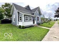 Charming two-story home with well-maintained lawn and welcoming curb appeal at 675 W Morgan St, Martinsville, IN 46151