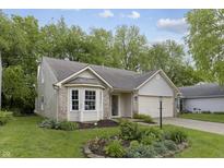 Charming single-Gathering home with well-maintained lawn and attached garage in a quiet neighborhood setting at 5988 White Birch Dr, Fishers, IN 46038