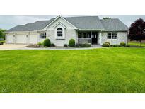 Charming single-story brick home with well-manicured lawn and inviting curb appeal at 6190 S 425 W, Pendleton, IN 46064