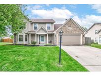 Charming two-story home featuring a well-maintained lawn and inviting front porch at 18915 Fairfield Blvd, Noblesville, IN 46060