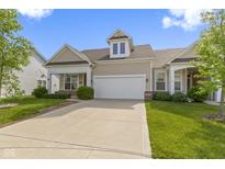 Inviting exterior elevation of a single-Gathering home with a well-manicured lawn and an attached two-car garage at 4181 Gordman Dr, Whitestown, IN 46075