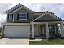Charming two-story home with a large two-car garage and craftsman-style details at 16835 Cheddar Dr, Noblesville, IN 46060