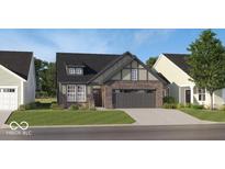 Charming single-Gathering home with brick facade, a two-car garage, and manicured lawn at 5151 Nettleton Way, Avon, IN 46123