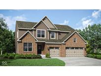 Beautiful two-story home with brick and siding exterior, showcasing a two-car garage and well-maintained lawn at 5312 Summerton St, McCordsville, IN 46055