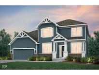 Charming two-story home with a well-manicured lawn and inviting entrance at 6551 Ambassador Dr, Plainfield, IN 46168