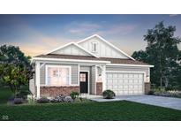 Charming single-Gathering home featuring a two-car garage and manicured front yard, perfect for suburban living at 9363 Abner St, McCordsville, IN 46055