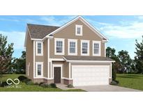 Charming two-story home with a brick foundation, inviting front door, two-car garage and neutral tan siding at 1980 Black Oak Dr, Shelbyville, IN 46176