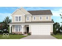 Charming two-story home features a covered front porch and a two-car garage at 1126 Bevy Blvd, Danville, IN 46122