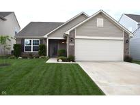 Charming single-Gathering home featuring well-manicured lawn, flower beds, brick accents, and attached two-car garage at 10731 Jimmy Lake Dr, Indianapolis, IN 46239