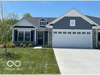 Charming single-story home showcasing a 2-car garage, stone accents, and beautiful curb appeal at 19584 Atwater Ave, Sheridan, IN 46069