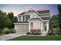 Charming two-story home featuring a landscaped yard and an attached two car garage at 2693 Penn Ave, Plainfield, IN 46168