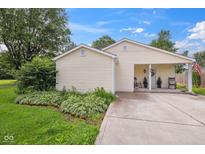Charming single story home with covered front porch and landscaped garden at 71 W County Road 500 S, Clayton, IN 46118