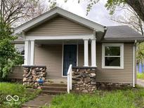 Charming single-story home with stone accents and a welcoming front porch at 2624 E 17Th St, Indianapolis, IN 46218
