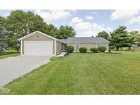 Charming single story home featuring a one car garage and meticulously manicured lawn at 3020 E 400 S, Lebanon, IN 46052