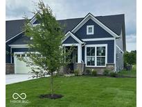 Charming single-Gathering home boasting beautiful blue siding, a well-manicured lawn, and an attached two-car garage at 3866 Holly Brook Dr, Westfield, IN 46062
