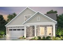 Beautiful home with a stone facade, white trim, and attached two car garage at 14877 Higgins Dr, Westfield, IN 46074