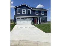 Charming two-story home with navy siding, white trim, a red door, and a spacious two-car garage at 2057 Eldin Ct, Whitestown, IN 46075