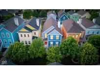 Aerial view of colorful, two-story homes with landscaped yards in a vibrant community at 2075 Rhettsbury St, Carmel, IN 46032