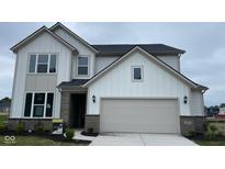 New construction home featuring a neutral color palette and attached two car garage at 6338 Rippling Rock Dr, Plainfield, IN 46168
