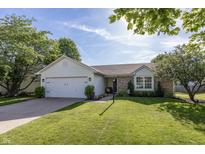 Charming single-story home featuring a well-manicured lawn, attached two-car garage, and tasteful landscaping at 15388 Follow Dr, Noblesville, IN 46060