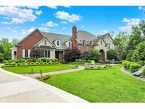 Beautiful brick and stone home with manicured landscaping and inviting curb appeal at 20170 Starlight Ct, Noblesville, IN 46062