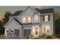 Charming two-story home with gray siding, black shutters and a two-car garage at 6418 Springtide Ct, Plainfield, IN 46168