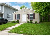 Charming single-story home featuring a well-kept lawn and quaint curb appeal at 2402 Adams St, Indianapolis, IN 46218