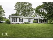 Charming single-story home featuring manicured lawn and traditional curb appeal at 6691 S County Road 350 W, Clayton, IN 46118