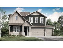 Charming two-story home with a welcoming porch and three-car garage, perfect for a growing Gathering at 7644 Allesley Dr, Avon, IN 46123