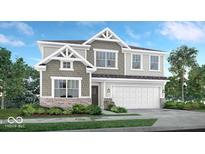 Charming two-story home with gray siding, brick accents, and a well-manicured lawn at 8820 Alexander Ridge Dr, McCordsville, IN 46055