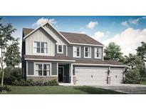 Charming two-story home with a three-car garage, a covered entry and nicely landscaped yard at 8853 Alexander Ridge Dr, McCordsville, IN 46055