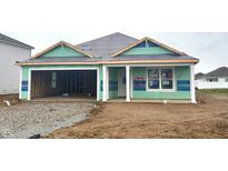 Exterior home during construction featuring open garage and covered porch, ready for customization and future memories at 1170 Mcbride St, Greenfield, IN 46140