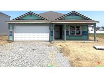 Charming single-story home featuring a two-car garage and a covered front porch at 1170 Mcbride St, Greenfield, IN 46140