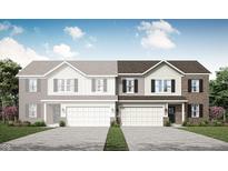 Two-story townhome showing brick and siding front with attached garage and neutral color palette at 2948 Woods Edge Dr, Greenwood, IN 46143