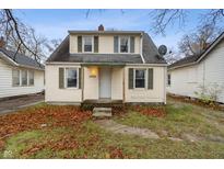 Charming two-story home with siding and inviting front entrance at 3305 N Arlington Ave, Indianapolis, IN 46218