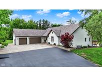 Charming single-Gathering home with a well-manicured lawn, two car garage and brick accents at 4495 W Stones Crossing Rd, Greenwood, IN 46143