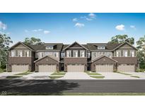 New brick townhome with two-car garage and neutral color palette at 6574 Halsey St, Zionsville, IN 46077